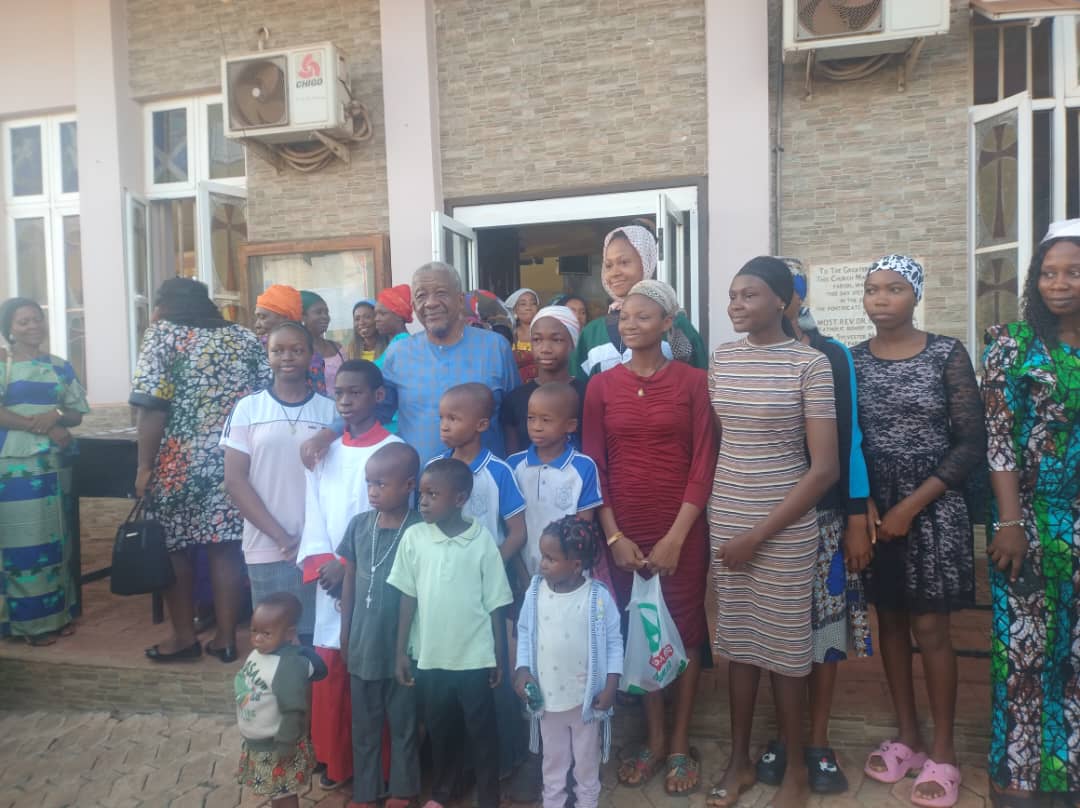 Families and children participating in the birthday celebration